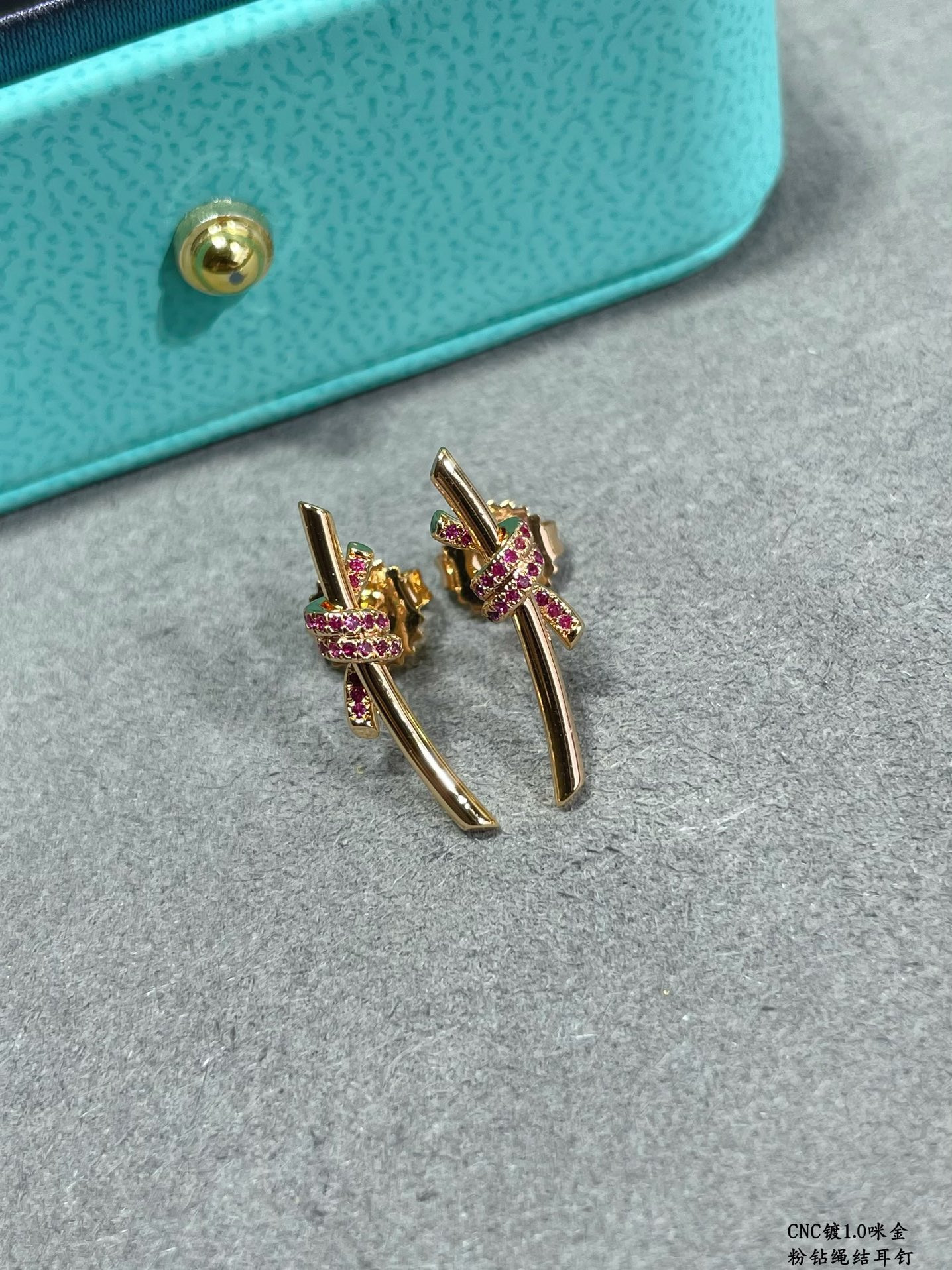 t*f*ny & co. pink Di*m*nd t wire knot stud earrings