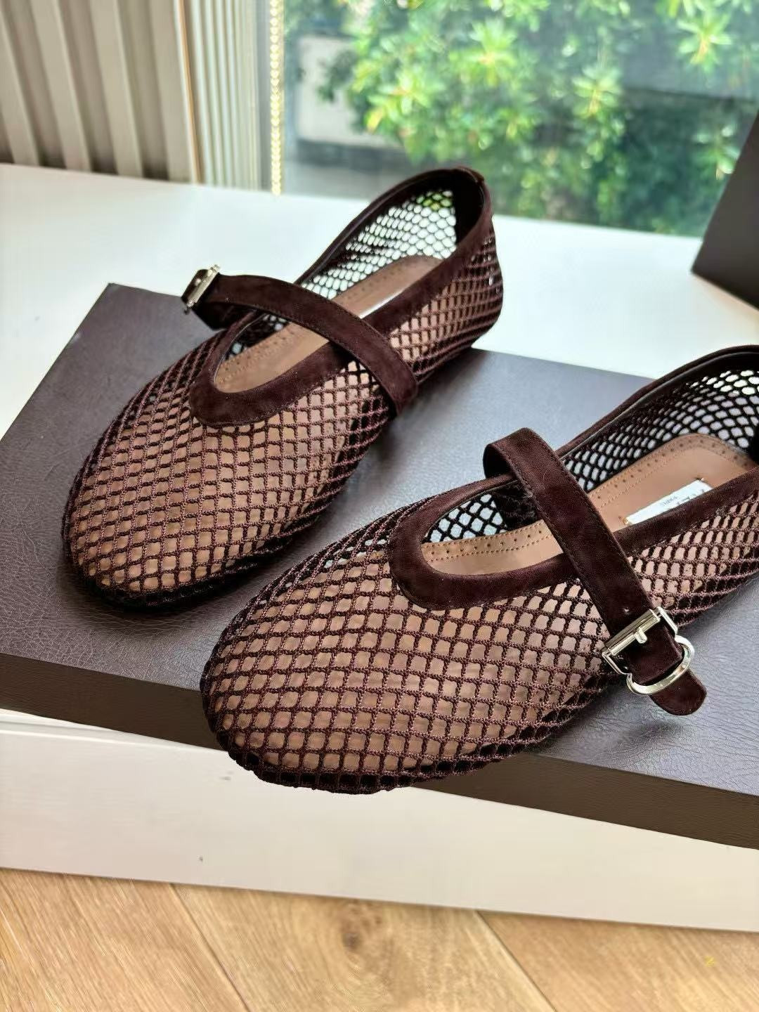 UA ALAÏA BALLET FLATS IN FISHNET