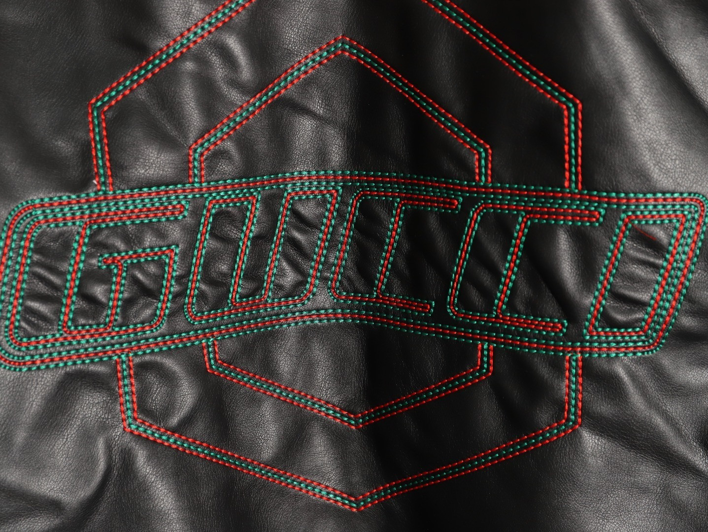 G*u*i leather jacket