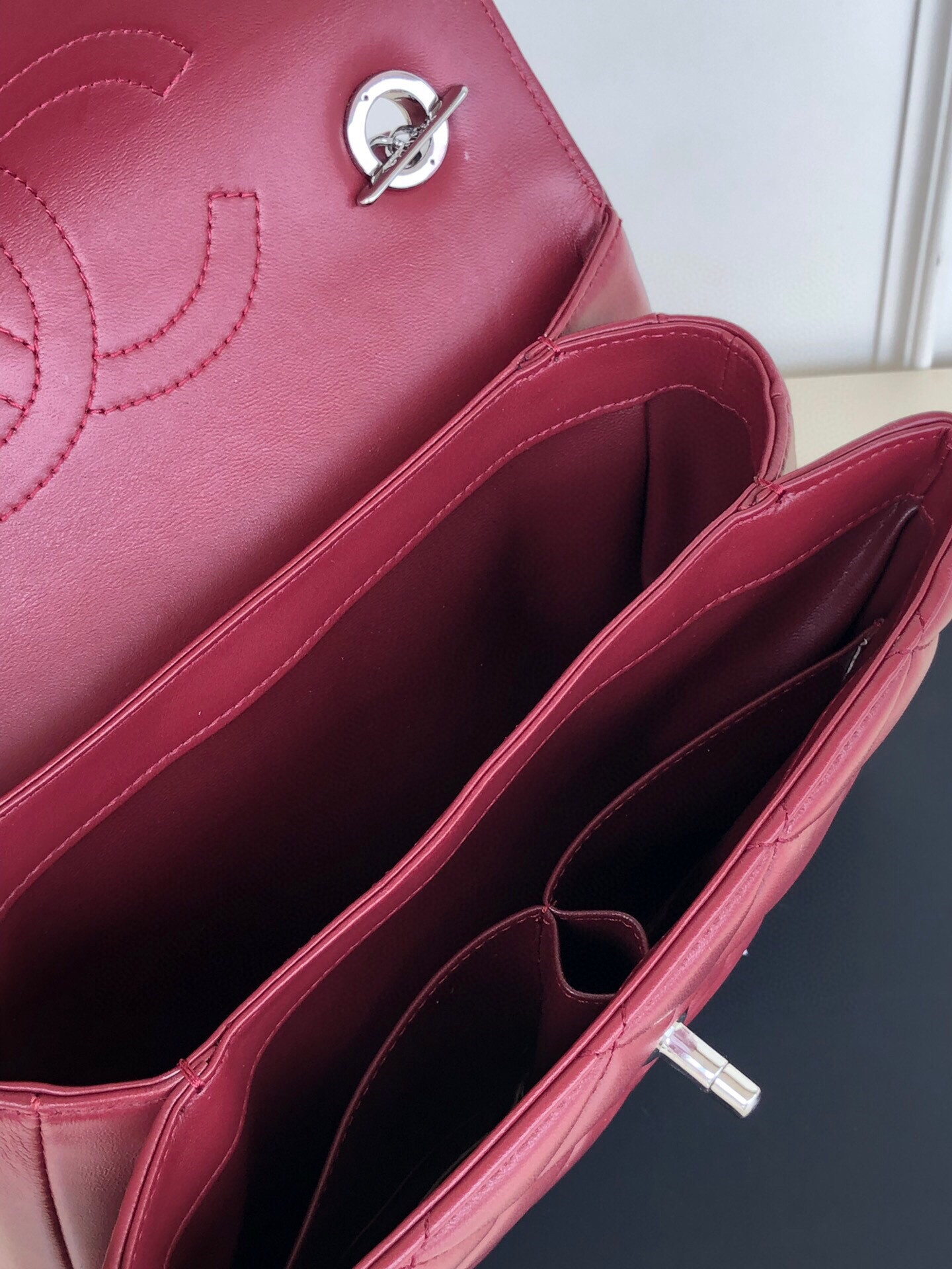 Ch*el flap bag with top handle 6.6 × 9.8 × 4.7 in