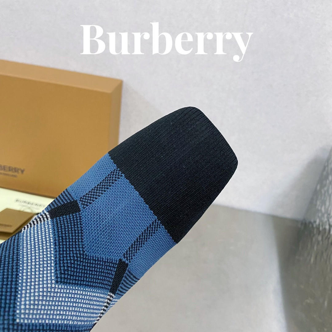 ua B**rry check high boots